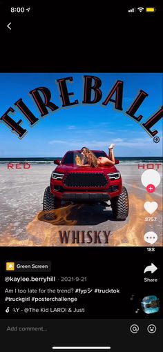 a red truck driving down a road under a blue sky with the words fireball on it