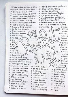 an open notebook with the words bucket list written in cursive writing on it