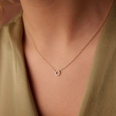 Made to Order. Gold Kt: 14K Round Diamond: 10 pcs 1.25MM Total CTW: 0.10ctw Diamond Color-Clarity: G Color Si Clarity Setting Type: Prong Adorn your neck with beauty and unity in our mini diamond circle necklace. This gold diamond necklace features a stunning circle pendant encrusted with ten small diamonds in a prong setting. The circle represents unity, wholeness, and protection so this special necklace will make a thoughtful gift for someone you love. White 14k Gold Solitaire Necklace With Brilliant Cut, White Diamond Necklace In 14k Gold, White Diamond Round Cut Necklace In 14k Gold, Yellow Gold Round Cut Lab Grown Diamond Necklace, Everyday Brilliant Cut Round Diamond Necklace, Dainty Diamond Necklace With Single Cut, Delicate Round Pendant Diamond Necklace, 14k Gold Diamond White Necklace With Round Cut, Yellow Gold Necklace With Lab Grown Diamond Round Cut