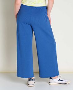 We took details from our favorite Chaka skirt—wide waistband, super soft fabric, wear-anywhere-attitude, and turned them into a year ‘round pant. A fan favorite for good reason: sweatpant comfortable, going-out presentable. Relaxed Fit Athleisure Bottoms With Pull-on Style, Relaxed Fit Pull-on Athleisure Bottoms, Loungewear High-waisted Pants With Wide Waistband, Comfy Wide-leg Pants With Ribbed Waistband, High-waisted Pants With Wide Waistband For Loungewear, Versatile Stretch Bottoms For Lounging, Relaxed Fit High-waisted Yoga Pants With Elastic Waistband, Comfy Wide Leg Pants With Ribbed Waistband, Comfortable High-waisted Pants With Comfort Waistband