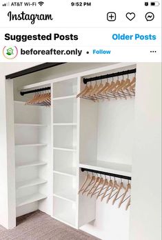 an empty closet with white shelves and wooden hangers