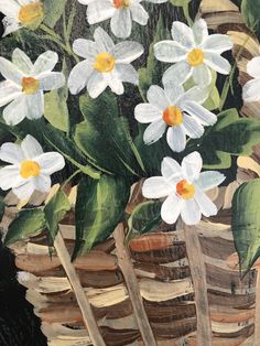 a painting of white flowers in a basket with green leaves on the bottom and yellow center