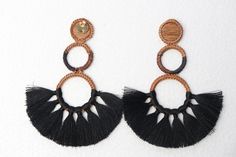 Black & Tan Palm with Tassels Earrings - Handmade - Black & Brown Measurements: 3.5 in Long - This earring is Completely handmade using iraca Palm and Tassels - Elegant & High Quality - ⭐️Shipping: DHL : * USA, Central & North America: 2-3 Business Days * Rest of The World: 4-6 Business Days - Earrings Handmade Earrings Straw earrings Flower earrings Tassels Earrings Gold Earrings Colorfull pink earrings Black Handwoven Jewelry For The Beach, Black Handwoven Jewelry For Beach, Handwoven Black Jewelry For The Beach, Handmade Black Earrings For Beach, Black Bohemian Woven Jewelry, Black Woven Bohemian Jewelry, Black Handwoven Dangle Earrings, Traditional Black Tassel Earrings, Straw Earrings