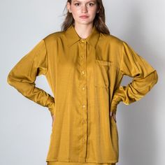 This dad-style shirt has a loose fit and an effortless silhouette.  Ethically handcrafted in Athens by 3 Greek artisans from silky viscose. It has a very comfortable fit and feels so soft to the skin. It's a timeless, day-to-night piece, a versatile wardrobe essential. Pair it with its matching skirt or pants from the collection for an effortless style in a total monochrome. 60% Viscose 40% Ryon Cold delicate hand-wash or dry clean Silk Tops With Relaxed Fit For Loungewear, Viscose Button-up Shirt For Fall, Relaxed Fit Viscose Blouse For Loungewear, Fall Silk Tops For Daywear, Relaxed Fit Viscose Shirt For Daywear, Silk Tops For Fall Daywear, Classic Silk Tops With Relaxed Fit, Classic Relaxed Fit Rayon Blouse, Fall Silk Shirt With Spread Collar