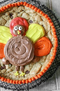 a decorated cookie in the shape of a turkey