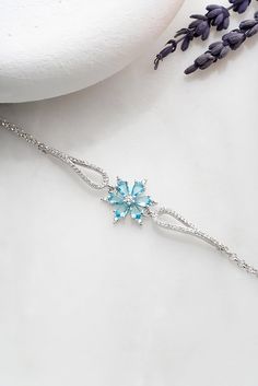 Metal Used: 925 Carat Silver  Weight: 5.00 Gr Figure Width: 1.65 Cm Figure Height: 1.65 Cm Chain Length: 16 Cm + 3 Cm Stone Type: Zircon and Aquamarine Coating: Rhodium Plated  Maintenance: Perfume, Alcohol, It does not darken as long as contact with substances such as cream and bleach is avoided. Packaging: All Products Are Sent in a Gift Box. Cheap Blue Dangle Bracelets, Cheap Hypoallergenic Blue Jewelry, Cheap Light Blue Bracelet Jewelry, Cheap Blue Jewelry With Bracelet Strap, Unique Blue Cheap Bracelets, Luxury Handmade Light Blue Jewelry, Cheap Blue Wedding Bracelets, Trendy Cheap Blue Jewelry, Cute Cheap Light Blue Jewelry