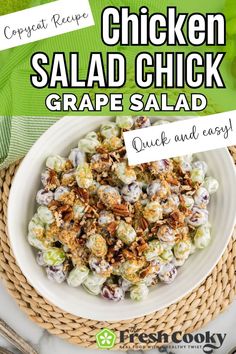 chicken salad with grapes and nuts in a white bowl