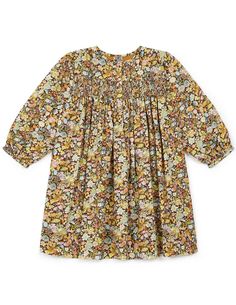 Dress from the Bonton brand. The dress is made from a pleasant to the touch material in a flower pattern. 

Colour: Multi
Material: 100% Cotton Multicolor Smock Dress For Fall, Fitted Multicolor Floral Print Smocked Dress, Fitted Multicolor Smocked Dress With Floral Print, Multicolor Cotton Smocked Dress With Floral Print, Brown Printed Dress For Fall, Multicolor Floral Print Cotton Smocked Dress, Brown Smocked Spring Dress, Fitted Multicolor Floral Dress, Brown Smock Spring Dress