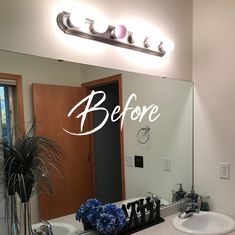 a bathroom mirror with the words before and after written in white lettering on it next to a sink