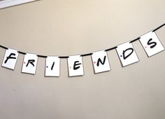 the word friends spelled out on a string