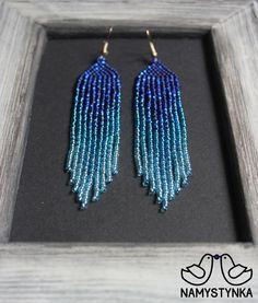 These blue long earrings are made of high-quality Czech beads and strong synthetic thread. They are elegant, fashionable, and highly versatile, suitable for everyday wear. Features: Sterling silver components Color: blue. This item is currently in stock. Once purchased, it will be shipped from Ukraine within one to two days, and should arrive within one to three weeks. You must be completely satisfied. If you find merchandise unsatisfactory for any reason, return it within 10 days and your money Blue Chandelier, Beadwork Earrings, Beading Jewelery, Earrings Beaded, Ear Rings, Earrings Blue, Seed Bead Earrings, Earrings Boho, Czech Beads