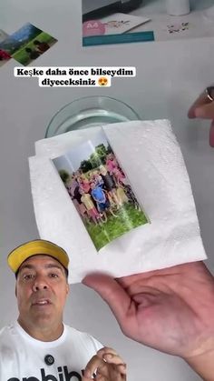 a man holding up a photo in front of his face with the caption that reads, i don't know what this is