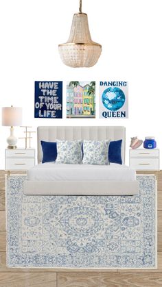 a bedroom with blue and white decor on the walls, bedding, lamps, and pictures