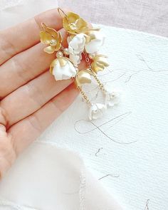 Blooms Wedding Earrings Bridal Earrings Flower Earrings - Etsy Poland Dainty White Dangle Bridal Earrings, White Dangle Bridal Earrings, Delicate Gold Earrings For Bridal Shower, Elegant Bridal Earrings With Handmade Gold Flowers, Graceful White Dangle Bridal Earrings, Elegant Gold Bridal Earrings With Handmade Flowers, Graceful White Wedding Earrings, Gold Bridal Drop Earrings With Flower Decoration, Delicate White Dangle Chandelier Earrings