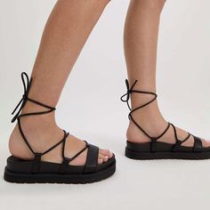 This Easy-To-Wear Lace-Up Tie Sandal Is The Perfect Summer Shoe For Any Occasion. 2" Platform Lace-Up Tie Closure Cushioned Insole Polyurethane Upper, Polyurethane Lining, Rubber/Sock Liner Outsole Summer Flat Platform Lace-up Sandals, Flat Platform Lace-up Sandals, Black Platform Lace-up Sandals For Beach, Black Platform Lace-up Summer Sandals, Black Platform Lace-up Sandals For Summer, Black Lace-up Summer Sandals, Flat Heel Lace-up Synthetic Sandals With Removable Insole, Floral Espadrilles, Vegan Heels