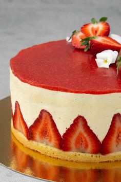 a cake with strawberries and cream on top