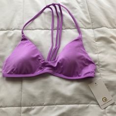 Nwt. Never Worn. Trouble In Paradise. Lilac Jewel. Removable Pads. Multiple Loop Holes In Strap For Adjustment. Vertical Spaghetti Straps Are Moveable. Matching Bottoms In A Separate Listing. Bundle To Save. Purple Summer Halter Top For Beach, Purple Triangle Halter Top For Beach, Seamless Strappy Halter Top For The Beach, Purple Halter Top For Beach Vacation, Summer Underwire Bra In Purple, Summer Purple Bra With Padded Cups, Beach Bra With Adjustable Straps And Stretch, Summer Purple Underwire Bra, Purple Underwire Summer Bra