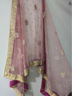 This Bridal Dupatta is sequin embroidered on net with beautiful golden border. This can be your wedding dress chunni for Indian occasion wear for festival. This has perfect bling for you to look classy and ethnic at same time. We can make in other colors.Pair it up with skirt and blouse from our shop.NOTE : There might be slight color variation due to different colour settings. Festive Anarkali Dupatta With Mirror Work, Anarkali Dupatta With Mirror Work For Eid, Festive Churidar With Sheer Chanderi Dupatta, Festive Semi-stitched Tissue Silk Dupatta, Navratri Dola Silk Churidar With Sheer Dupatta, Diwali Churidar With Sheer Dupatta And Chanderi Fabric, Diwali Churidar With Sheer Dupatta In Chanderi, Gold Tissue Silk Anarkali Set With Sheer Dupatta, Gold Anarkali Set With Sheer Dupatta In Tissue Silk