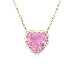 This charming classic solitaire pink sapphire pendant allures with its delightful hue. Crafted in 14k yellow gold, its design showcases a heart-shaped pink sapphire secured in a bezel setting. Pink Sapphire Jewelry, Pink Sapphire Pendant, Sapphire Birthstone, Sapphire Necklace Pendants, Platinum Rose Gold, Sapphire Solitaire, Heart Pendant Gold, Rose Gold Heart, Sapphire Pendant