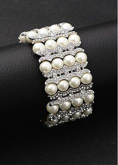 In Stock Graceful Alloy Bracelets With Rhinestones & PearlsFabric: Rhinestones & PearlsDetails: The bracelet is made of rhinestones & pearls. The color is as the picture shown. Pearl Embellished Party Bracelet, Elegant Beaded Bangle Bracelet With Rhinestones, Elegant Beaded Bangle Bracelets With Rhinestones, Wedding Metal Beaded Pearl Bracelet, Party Crystal Beaded Pearl Bracelet, Adjustable Crystal Pearl Bracelet For Party, Elegant Rhinestone Bracelets With Round Beads, Elegant Bracelets With Rhinestone Round Beads, Silver Crystal Pearl Bracelet For Party