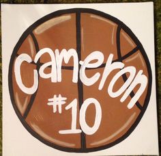 a basketball with the words camera 10 painted on it