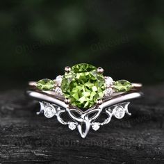 "This is a natural peridot engagement ring in solid gold,about 7mm 1.3ct round cut.  The accent stones are round moissanites and marquise cut 2x4mm peridot. The matching band stones are round  moissanites. The band width about 1.3-1.4mm. It can be made in any ring size. However please contact me to custom make it to a special big or small size. It can be made in white gold,rose gold or yellow gold with 14k or 18k. However for some people who are nickel allergic,I can also make it to 925 sterling silver to make you can wear it. The ring is handmade,very high quality! 30 days money back guarantee. Returns & Warranty 30-Day money back guarantee (starting from the day of delivery). \"Made to Order\" purchases qualify for our 30-day money back guarantee. The 30-day money back guarantee gives yo Victorian Peridot Ring, Fine Jewelry Peridot Diamond Wedding Ring, Fine Jewelry Peridot Diamond Ring For Wedding, Elegant Peridot Diamond Ring With Prong Setting, Wedding Jewelry With Prong Set Peridot, Wedding Jewelry With Prong Setting And Peridot, Wedding Jewelry With Peridot In Prong Setting, Round Cut Peridot Wedding Jewelry, Elegant Peridot Promise Ring