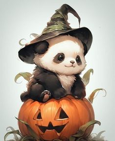 a panda bear sitting on top of a pumpkin