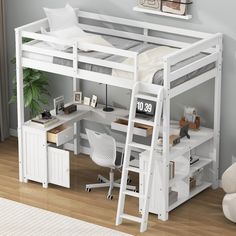 a white loft bed with desk underneath it