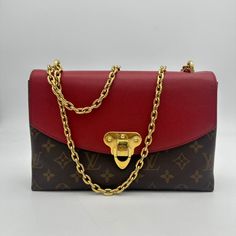 Brand: Louis Vuitton Condition: Excellent Condition Details: Minimal signs of wear, well-maintained, and looks almost new. Exterior Material: Leather Interior Material: Leather Lining Material: Leather Exterior Color: Brown Interior Color: Red Lining Color: Red Style: Shoulder Bag Product Line: Louis Vuitton Monogram Size: Medium Handle/Strap Material: Metal Handle/Strap Color: Gold Hardware Color: Gold Character: None Pattern: Monogram Dimensions: 10"W x 7"H x 3"D Handle Drop: None Strap Drop: Luxury Red Bag With Lock, Elegant Red Bags With Lock, Formal Monogram Canvas Bags With Lock, Elegant Red Monogram Canvas Bag, Red Bags With Gold-tone Hardware In Monogram Canvas, Red Bags With Gold-tone Hardware And Monogram Canvas, Red Monogram Canvas Bag With Gold-tone Hardware, Classic Red Monogram Canvas Bag, Elegant Red Monogram Canvas Shoulder Bag