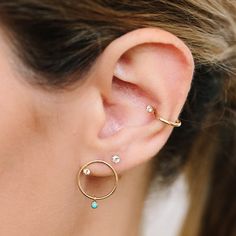 14k gold thick wire ear cuff with a prong set round white diamond that sits inside the ear SPECIFICS • cuff is approx. 13mm in diameter• round diamond is approx. 2mm• white diamonds .03 ctw 14k White Gold Single Ear Cuff, 14k Gold Pierced Ear Cuff Fine Jewelry, Single 14k White Gold Ear Cuff, 14k Gold Pierced Round Ear Cuff, Yellow Gold Ear Cuff With Prong Setting, Yellow Gold Minimalist Ear Cuff, Fine Jewelry 14k Gold Cartilage Earrings With Prong Setting, Fine Jewelry Yellow Gold Single Ear Cuff, Yellow Gold Round Ear Cuff