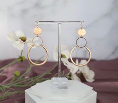 Bronze Gold Dangling Round Earrings. These are beautiful earrings to wear every day! They're lightweight and comfortable, and they add just the right amount of sparkle to any outfit. Rose Gold Small Hoop Earrings For Party, Modern Nickel-free Rose Gold Earrings, Wedding Circle Earrings In Metal, Minimalist Cadmium-free Dangle Earrings, Trendy Hypoallergenic Rose Gold Earrings, Rose Gold Nickel-free Small Hoop Earrings, Trendy Hypoallergenic Wedding Earrings, Trendy Hypoallergenic Earrings For Wedding, Modern Hypoallergenic Rose Gold Earrings