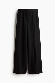 Dress pants in woven fabric. Extended waistband tab with hook-and-bar fastener and zip fly with concealed button. Diagonal side pockets  welt back pockets  and flared legs with creases at front and back. Flared Pants, Flare Pants, Dress Pants, Black Pants, Woven Fabric, Black Women, The Selection, H&m, Bar