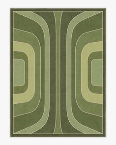 a green rug with an abstract design in the center and two intersecting lines on it