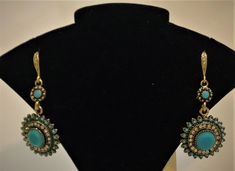 Dangling Costume Jewelry earrings in unconventional styles and beautiful stones. The stone colors are Ruby Red, Turquoise Green, Onyx Black, Emerald Green, and Sapphire Blue. Available in silver or gold covered medal. Beautiful Stones, Costume Jewelry Earrings, Red Turquoise, Turquoise Green, Dangling Earrings, Green Onyx, Sapphire Blue, Ruby Red, Emerald Green