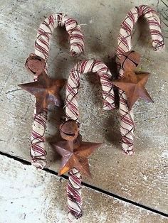 some brown and white candy canes with stars on them