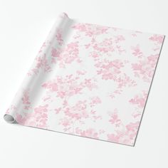 pink floral wrapping paper on white background