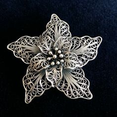 "Flower Brooch Flor de Amor - Sterling Silver Brooch - Filigree Brooch - Flower Jewelry - Handmade Jewelry - Gift for Mom - Gift for Her Filigree - delicate jewellery technique made from silver or golden threads \"embroidering\" kind of metalwork lace that is specific to Spain, especially an Andalusian town Cordoba, where they call it a cordobese filigree. This craftsmanship has been passed from generation to generation, nonetheless nowadays there are very few craftsmen left who know to perform Delicate Jewellery, Gemstone Brooch, Brooch Flower, Filigree Jewelry, Basic Jewelry, Filigree Pendant, Sterling Silver Brooch, Jewelry Techniques, Paper Jewelry