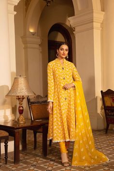 Bareeze Expressional Chikankari Er678 Yellow Collection 2021 Eid Dresses In Jamawar With Naqshi Detailing, Eid Jamawar Dresses With Naqshi Detailing, Eid Jamawar Dresses With Naqshi, Eid Naqshi Jamawar Dresses, Designer Naqshi Fitted Salwar Kameez, Fitted Naqshi Salwar Kameez For Designer Wear, Fitted Cambric Lawn Suit With Chikankari Embroidery, Festive Long Sleeve Cambric Anarkali Set, Designer Fitted Sharara With Naqshi Detailing