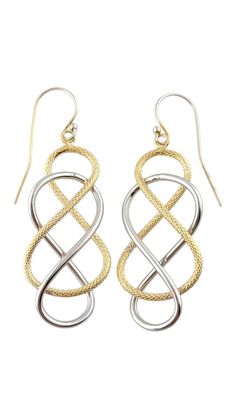 14K Yellow & White Gold Knot Braided Drop Earrings This gorgeous set of knot braided drop earrings were meticulously crafted from 14K white gold with a smooth finish as well as 14K yellow gold with a textured finish! Size: 50.25mm X 17.58mm X 5.81mm Weight: 1.54 dwt/ 2.39 g Hallmark: 14KT ITALY Very good condition, professionally polished. Will come packaged in a gift box or pouch (when possible) and will be shipped U.S. Priority Mail Insured. MM07092024/17KCS Gold Knot Earrings, Yellow Gold Drop Earrings, Knot Braid, Statement Drop Earrings, Gold Halo, Knot Earrings, White Gold Earrings, Modern Earrings, Gold Drop Earrings