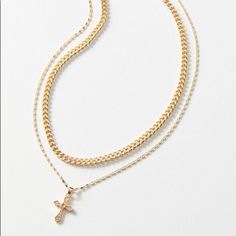 Brand New With Tags Product Sku: 49825839 ; Color Code: 070 Classic Cross Necklace Paired With A Chunky Curb Chain. Includes 2 Necklaces In Goldtone Finish, Set With Lobster Clasp Closures And Adjustable Extenders. Content + Care - Includes 2 Necklaces - Brass, Steel, Zinc - Wipe Clean - Imported Size - Length: 15.5”-17.5” - Width: 0.2”-0.6” Gold Necklace From Urban Outfitters As A Gift, Urban Outfitters Gold Necklace As A Gift, Elegant Gold Jewelry From Urban Outfitters, Elegant Gold Urban Outfitters Jewelry, Urban Outfitters Gold Jewelry For Gift, Urban Outfitters Gold Jewelry For Gifts, Necklace Set Gold, Urban Outfitters Jewelry, Layered Necklace Set