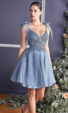 Sweet and sparkly, this short homecoming dress has sheer tulle shoulder bows that offer an adorable look for your semi-formal event. With a shimmering sequin bodice, this short party dress has a sheer inset at the plunging v-neckline and bowed shoulder straps that lead to the deep v-back. The short a-line dance dress has a fully-lined short skirt with a sheer tulle overlay that makes it a figure-flattering choice for homecoming, sweet-16 parties, and other fancy dances. Affordably priced under $ Short Tulle Skirt, Tulle Dress Short, Tulle Cocktail Dress, Dama Dresses, Smoky Blue, Tulle Mini Dress, Cinderella Divine, Embellished Shorts, Tulle Bows