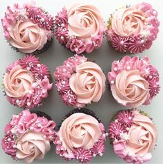 cupcakes with pink frosting and sprinkles arranged in a square pattern