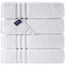 six white towels stacked on top of each other with blue and white tags hanging from them