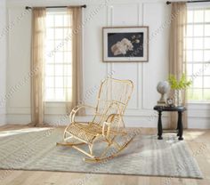 a rocking chair in the middle of a living room