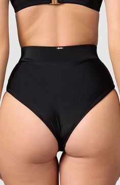 MBM Swim's super flattering, waist-snatching, leg-lengthening bikini bottom. Cheeky bottoms - Most flattering cut to accentuate your bottom Double lined Thick elastic waistband - Cinches in the waist for maximum tummy control and hourglass figure High cut at legs - Elongates the legs Imported Black Smoothing Brief Swimwear, High Waist Smoothing Swimwear, Black High-cut Leg Smoothing Swimwear, Shapewear Swimwear With High-cut Leg And Wide Waistband, Shapewear Swimwear With Wide Waistband And High-cut Leg, Sleek Fitted Swimwear Brief, Sleek Fitted Brief Swimwear, Smoothing Brief Bottoms For Poolside, Poolside Smoothing Brief Bottoms