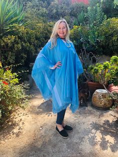 "Poncho top,Large ,knit poncho Blue ,Wool cotton Blend ,Fringed , XL,XXL beautiful large wool and cotton light blue color with soft 2\" fringe Red, Blue Size: Large, XL,XXL fits all sizes, the model is small, medium but this fits up to XXL Width: 52\" Length from top to bottom:36\" Excellent condition- clean, no marks or wear NK26B3 Poncho top,Large ,knit poncho Blue ,Wool cotton Blend ,Fringed" Oversized Fringe Casual Poncho, Oversized Fringe Poncho Casual Style, Long Sleeve Fringe Poncho, Casual Blue Cotton Poncho, Oversized Shawl Poncho With Tassels, Oversized Fringe Shawl Cape, Casual Blue Poncho Cape, Bohemian Blue Cape Poncho, Casual Blue Cape Poncho