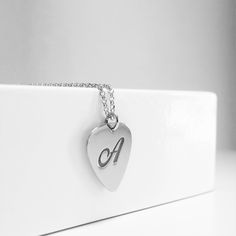 This is the piece of jewelry to get for every Rock lover. This Guitar pick necklace the perfect gift for guitarists ,music lovers, and for every musician. The necklace is totally handmade the base material is 14k or 9k Solid Gold,White or Rose gold Metal information and dimensions details: ---------------- Width : 17.00mm x 14.50mm Metal: Solid 9K Yellow ,White or Rose gold or Solid 14K Yellow ,White or Rose gold Solid gold chain 9k Yellow,White or Rose gold or Solid gold chain 14k Yellow,White Heart-shaped Music-themed Jewelry Gift, Music-themed Heart-shaped Jewelry Gift, Music-themed Pendant Necklaces As Gift, Nickel-free Music-themed Jewelry As Gift, Music-themed Pendant Necklace As Gift, Music-themed Pendant Jewelry For Gifts, Music-themed Pendant Jewelry As Gift, Music-themed Pendant Jewelry Gift, Music-themed Pendant Necklace