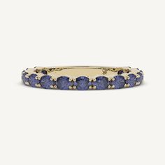 Raine features flowing oval blue Lab-grown Sapphire stones set in a half eternity shank. Dr Jewelry, Blue Sapphire Wedding Ring, Jewelry 2024, Sapphire Stones, Sweet Caroline, Sapphire Band, Classy Jewelry, Jewelry Lookbook, Diamond Rings Bands