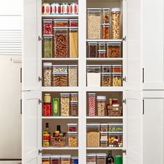 an organized pantry with lots of food in it