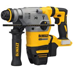 a cordless drill with two batteries on it